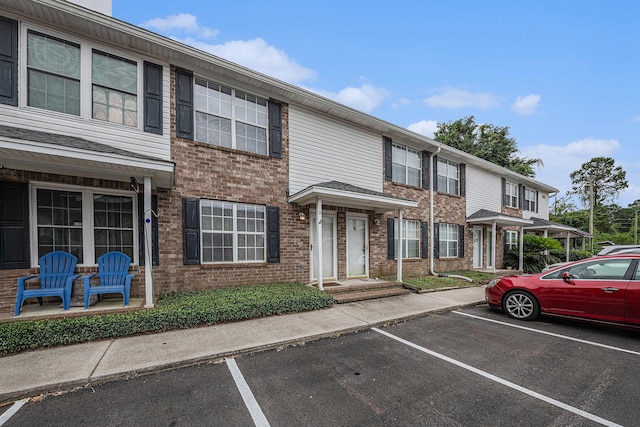 2045 Rondo St Unit B, Charleston, SC 29414 - view of property with uncovered parking and brick siding