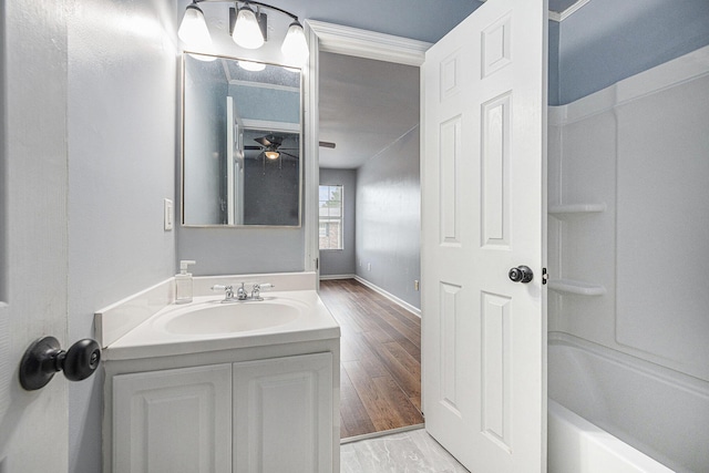 2045 Rondo St Unit B, Charleston, SC 29414 - full bathroom with vanity, wood finished floors, a ceiling fan, baseboards, and shower / tub combination