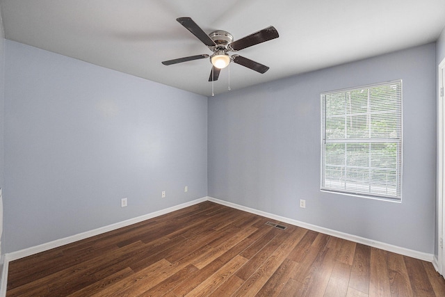 2045 Rondo St Unit B, Charleston, SC 29414 - spare room featuring dark wood finished floors, baseboards, and ceiling fan
