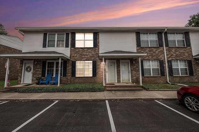 2045 Rondo St Unit B, Charleston, SC 29414 - multi unit property featuring uncovered parking, brick siding, and covered porch