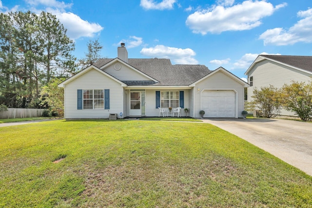 single story home featuring a front yard and a garage