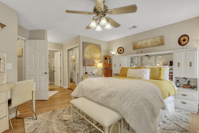 bedroom featuring ceiling fan and light hardwood / wood-style flooring