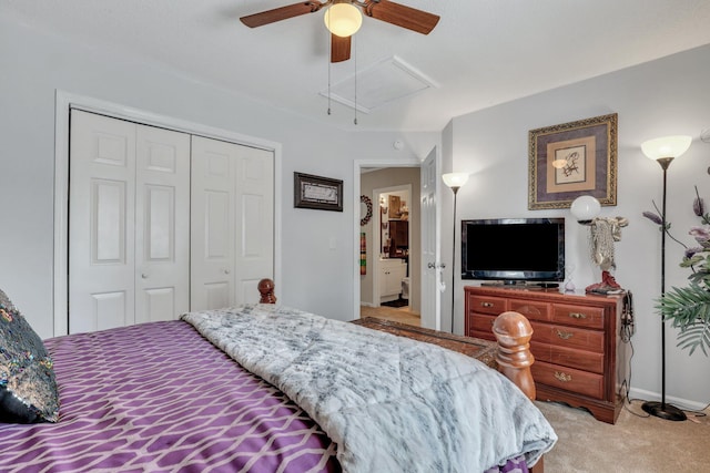 carpeted bedroom featuring ceiling fan and a closet