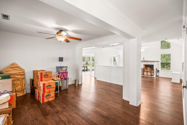 playroom featuring ceiling fan, crown molding, visible vents, and wood finished floors