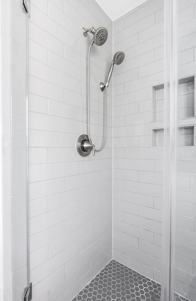 bathroom featuring a shower stall
