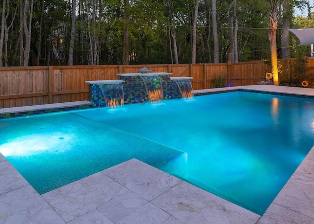 view of swimming pool with a fenced in pool and a fenced backyard