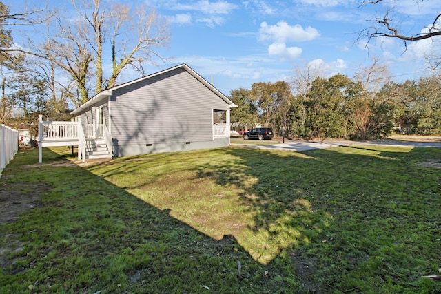 view of yard with a deck