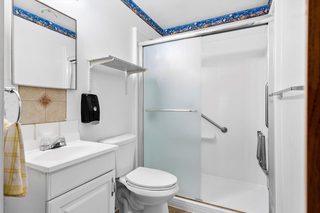 109 Rahway Rd, Goose Creek, SC 29445 - bathroom featuring a shower stall, vanity, toilet, and backsplash