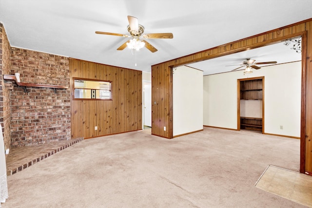 109 Rahway Rd, Goose Creek, SC 29445 - unfurnished living room with ceiling fan, wooden walls, carpet, and baseboards