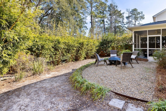 view of patio / terrace with a sunroom