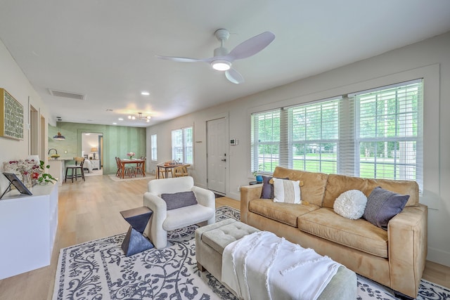 337 Price St, Goose Creek, SC 29445 - living room featuring light wood-type flooring and a ceiling fan