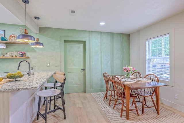 337 Price St, Goose Creek, SC 29445 - dining room with light wood-type flooring and baseboards