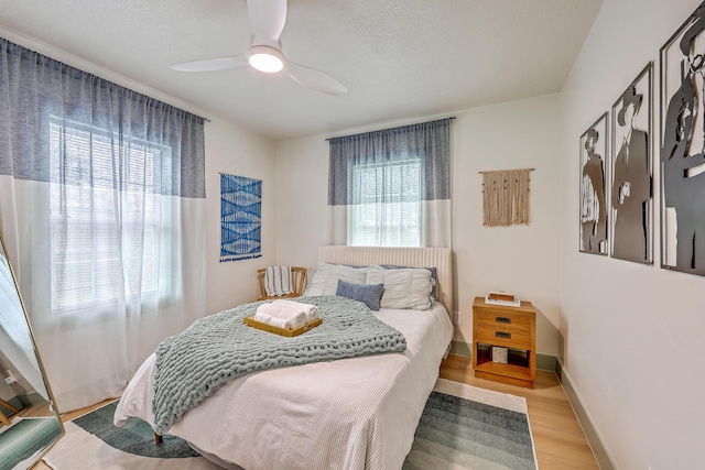 337 Price St, Goose Creek, SC 29445 - bedroom with light wood-type flooring, a ceiling fan, and baseboards