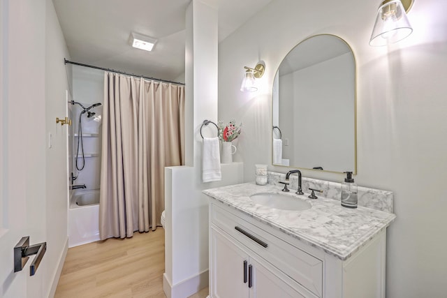 337 Price St, Goose Creek, SC 29445 - bathroom with vanity, toilet, wood finished floors, and shower / tub combo with curtain