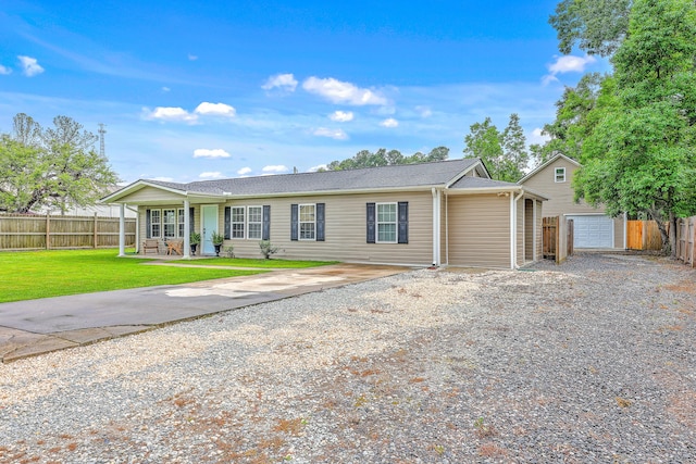 337 Price St, Goose Creek, SC 29445 - ranch-style home with gravel driveway, a garage, an outbuilding, and covered porch
