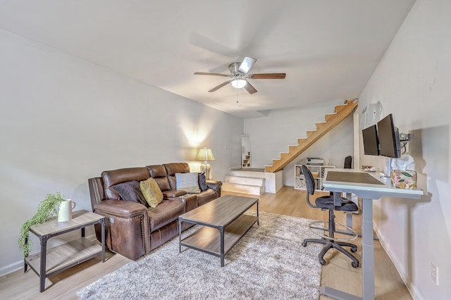 337 Price St, Goose Creek, SC 29445 - living room with stairs, ceiling fan, wood finished floors, and baseboards