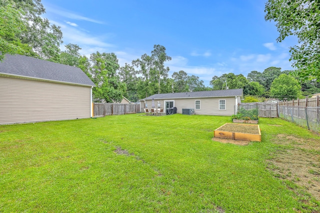 337 Price St, Goose Creek, SC 29445 - view of yard featuring a garden and central AC