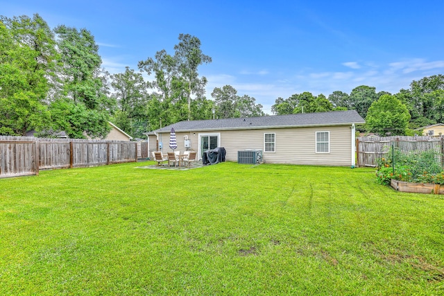 337 Price St, Goose Creek, SC 29445 - back of house featuring central AC, a patio area, a garden, and view of scattered trees