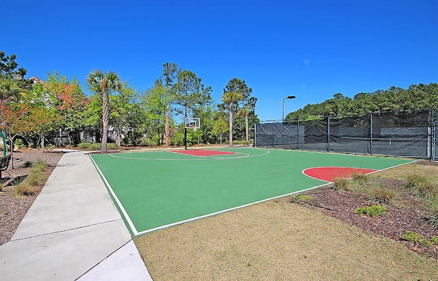 view of basketball court with tennis court