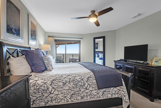 carpeted bedroom featuring ceiling fan and access to exterior