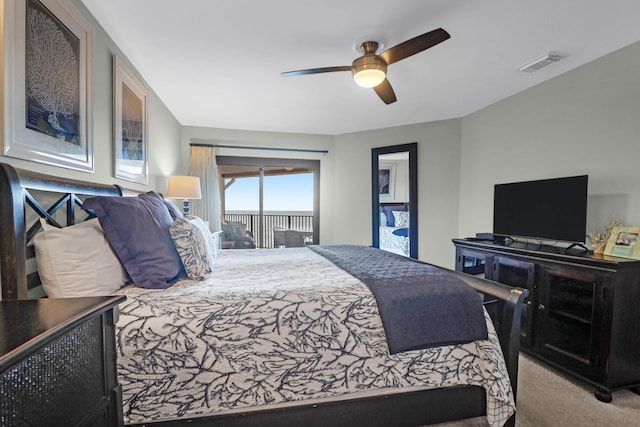 9002 Palmetto Dr Unit 512, Isle Of Palms, SC 29451 - carpeted bedroom with a ceiling fan and access to exterior