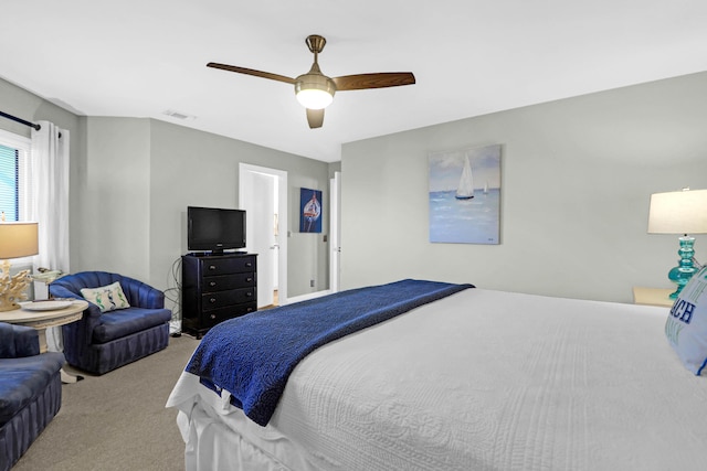 bedroom with light carpet and ceiling fan