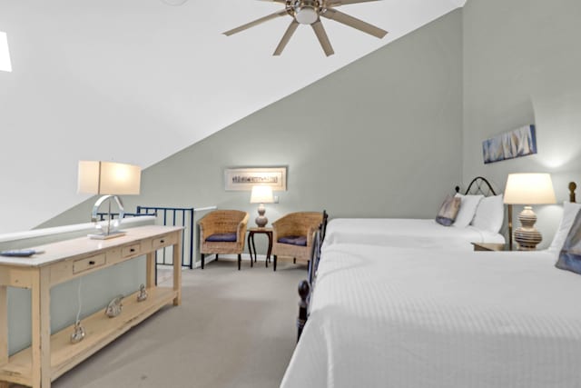 carpeted bedroom with lofted ceiling and ceiling fan