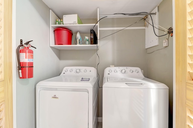 laundry room featuring washer and clothes dryer