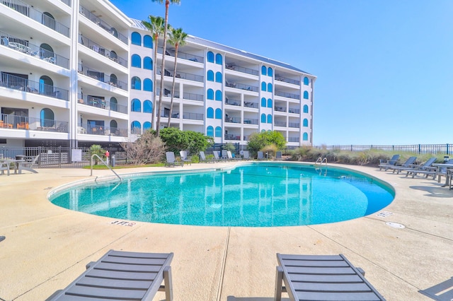 9002 Palmetto Dr Unit 512, Isle Of Palms, SC 29451 - community pool with fence and a patio