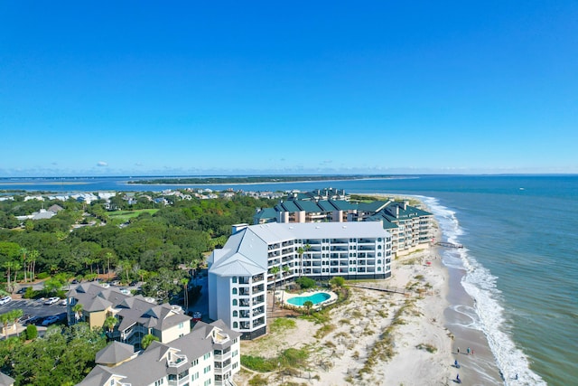 bird's eye view featuring a view of the beach and a water view