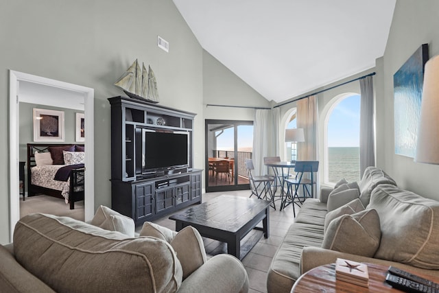 9002 Palmetto Dr Unit 512, Isle Of Palms, SC 29451 - living area featuring high vaulted ceiling and light tile patterned flooring