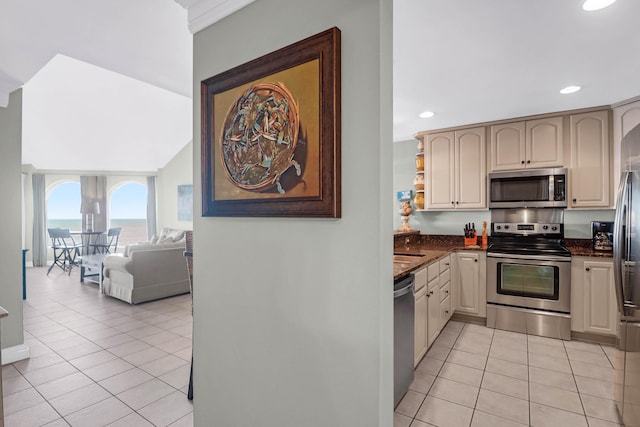 kitchen with stainless steel appliances and light tile patterned floors