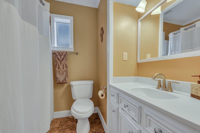 bathroom with crown molding, tile patterned flooring, vanity, and toilet