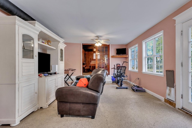 living room with ceiling fan