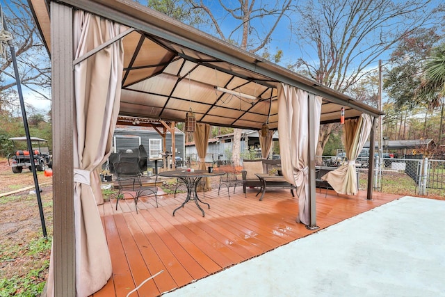 wooden deck with a gazebo