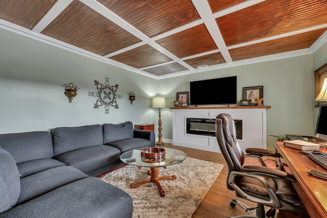 living room with wood-type flooring, coffered ceiling, ornamental molding, and wood ceiling