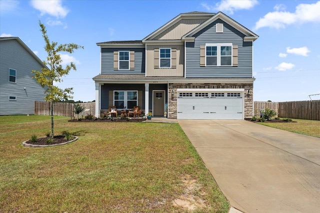 craftsman-style home with a garage and a front lawn