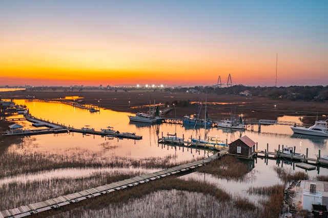 aerial view at dusk with a water view