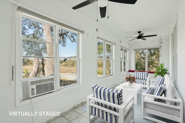 sunroom / solarium featuring a ceiling fan and cooling unit