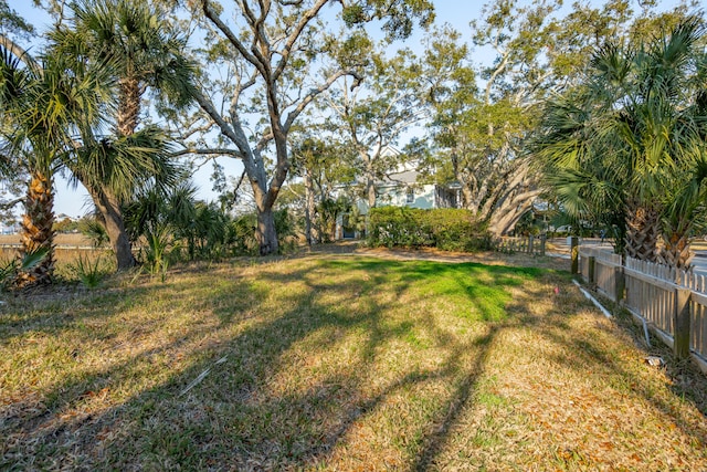 view of yard with fence