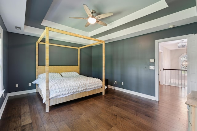 5195 Forest Oaks Dr, Hollywood, SC 29449 - bedroom with a raised ceiling, baseboards, and wood finished floors