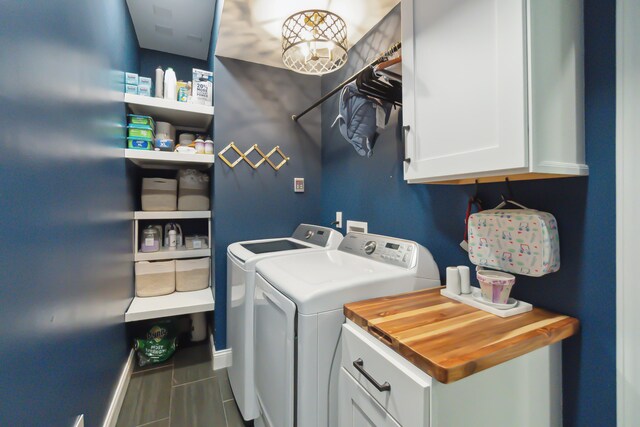 5195 Forest Oaks Dr, Hollywood, SC 29449 - washroom featuring washing machine and dryer, cabinet space, and baseboards