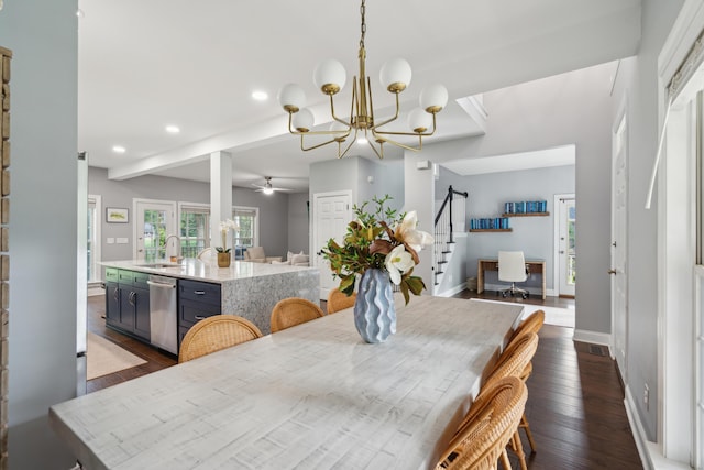 5195 Forest Oaks Dr, Hollywood, SC 29449 - dining room with stairway, recessed lighting, dark wood-style flooring, a ceiling fan, and a chandelier