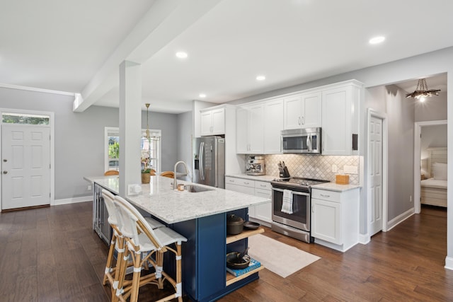 5195 Forest Oaks Dr, Hollywood, SC 29449 - kitchen featuring stainless steel appliances, a sink, backsplash, white cabinetry, and recessed lighting