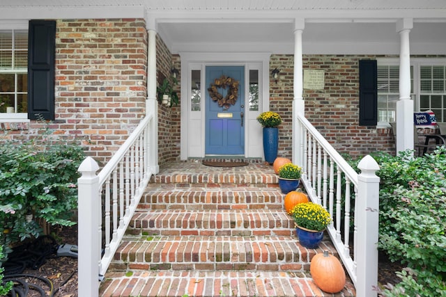 entrance to property with covered porch