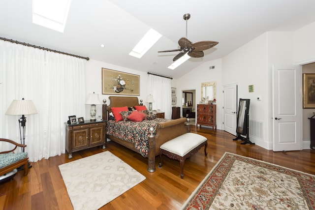 bedroom with a skylight, high vaulted ceiling, dark wood-type flooring, and ceiling fan