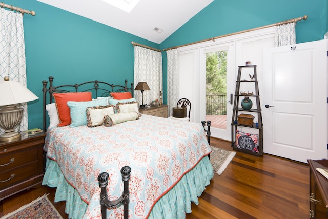 bedroom with vaulted ceiling, access to outside, and dark wood-type flooring