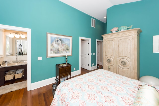 bedroom featuring dark wood-type flooring