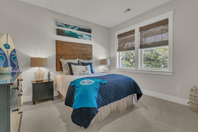 bedroom with light carpet