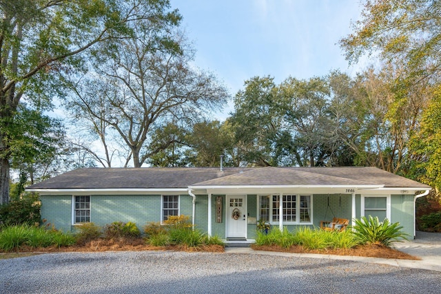 ranch-style house with a porch